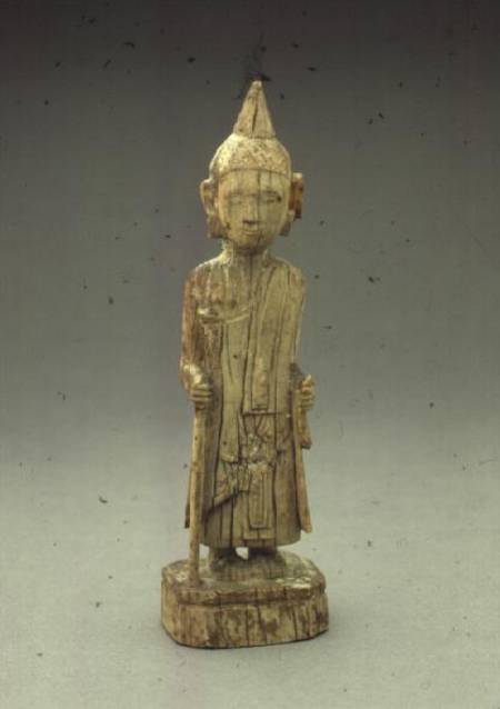 Ivory figure of the Penitent Buddha, walking and holding a staff,Burmese von Anonymous