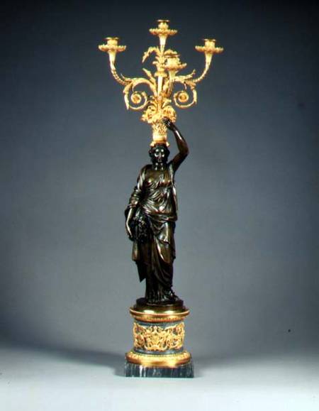 Louis XVI four-light candelabraormolu branches rising from a basket balanced on the head of a patina von Anonymous