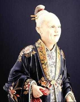 A seated nodding figure of a woman Qianlong p