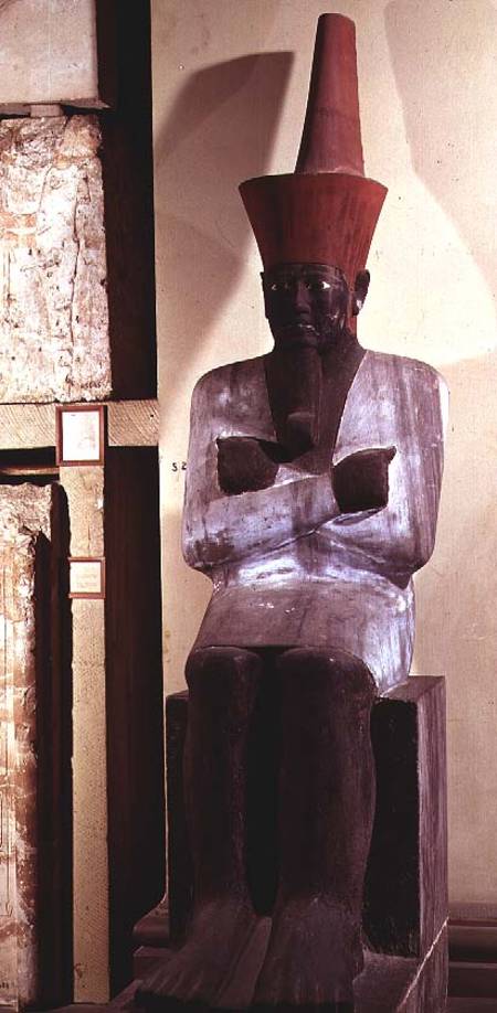 Statue of Mentuhotep II, enthroned and wearing the red crown of Lower Egypt, taken from the Mortuary von Egyptian