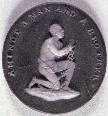 Wedgwood jasper medallion decorated with a slave in chains and inscribed with 'Am I not a Man and a von English School, (18th century)