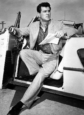 Rock Hudson in a convertible 1959