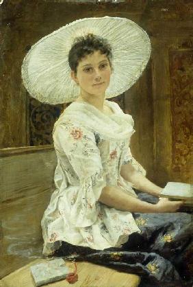 Junge Frau mit weißem Hut.