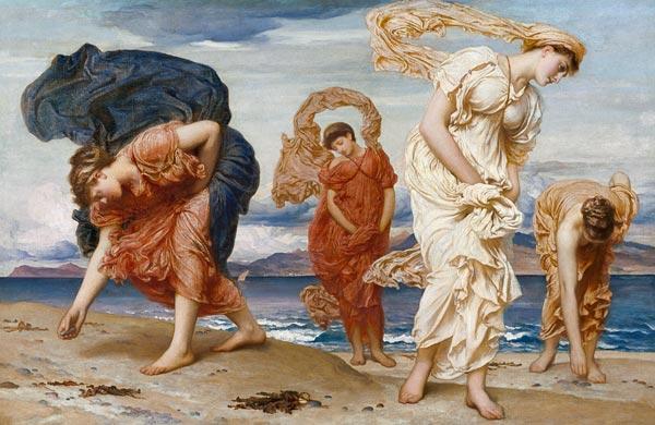 Filles grecques en prenant des pierres de silex sur la plage
