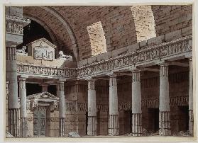 Dorische Säulenhalle mit Rundbogengewölbe und einem Portal mit zwei Sphingen