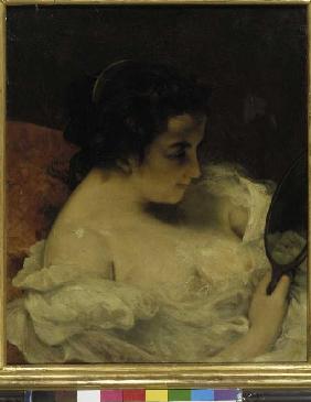Frau betrachtet sich im Handspiegel 1860