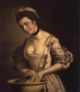 A Lady's Maid Soaping Linen