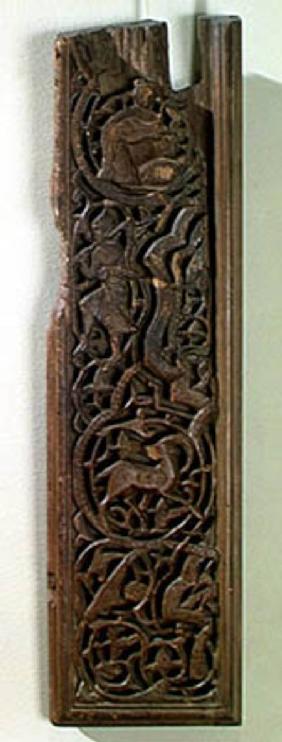 Carved panel decorated with a lute player