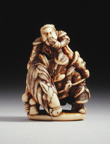 Netsuke in the form of a Chinese warrior on horseback with his attendant von Japanese School