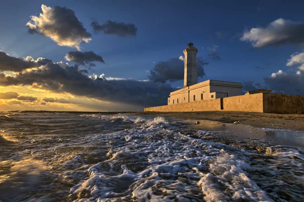 The lighthouse seen from the sea von Luigi Chiriaco
