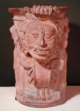 Cylindrical vase with the head of a sun god, Classic Period 7th-10th c
