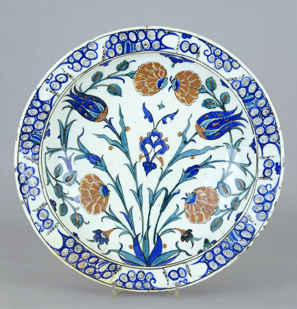 An Iznik Pottery Dish With Tulip And Peony Design, C von 