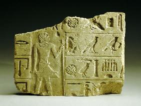An Egyptian Limestone Relief Fragment