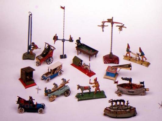 Lithographed Penny Toys with simple mechanisms by different makers including Meier, Distler etc. The von 