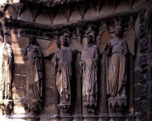 St. Nicaise flanked by two angels, sculptures on the exterior West Facade, 14th century originals (s von 