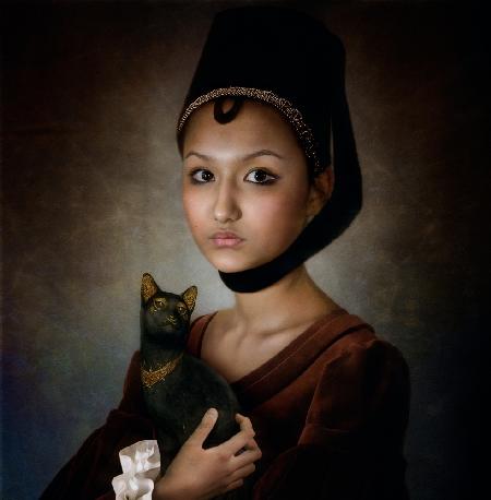 Porträt eines Mädchens mit schwarzer Katze